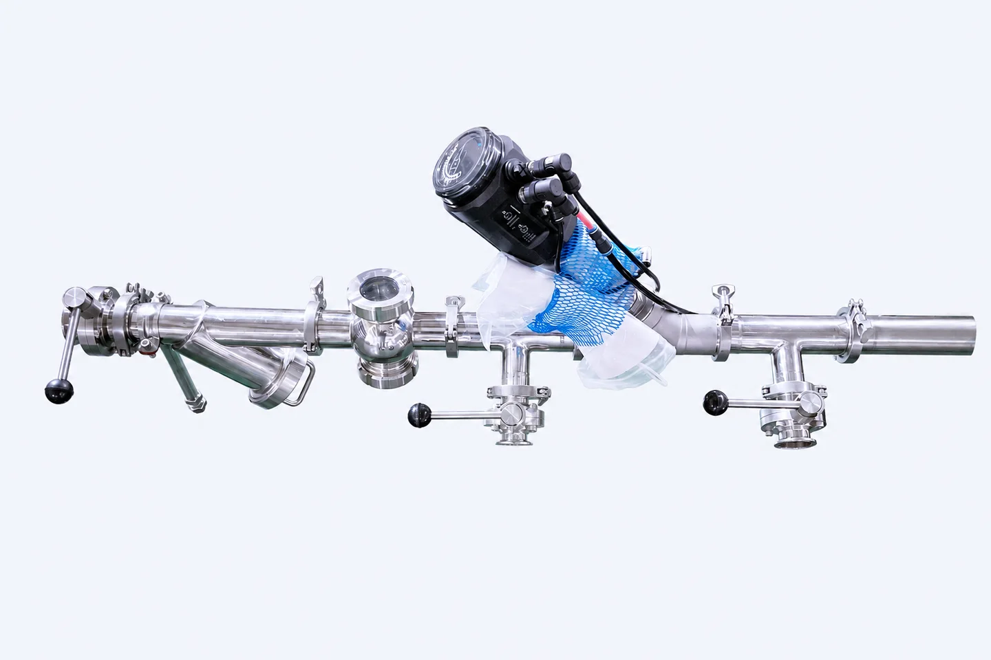 Stainless-steel sanitary pipe assembly with valves, clamps, sight glass and actuator